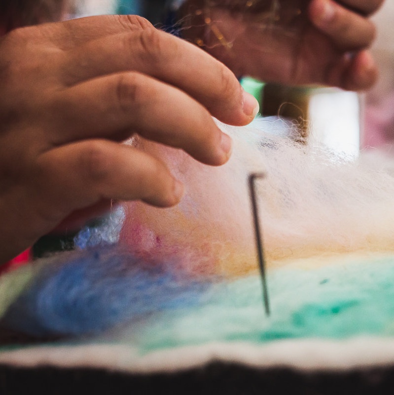 Jzin Teng's Hands, Hard At Work, Felting A Wool Relief