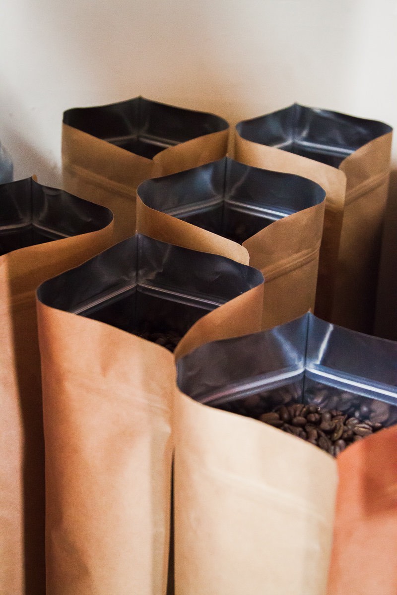 Bags of freshly-roasted, whole bean coffee at Wilson Coffee in Costa Mesa, California.