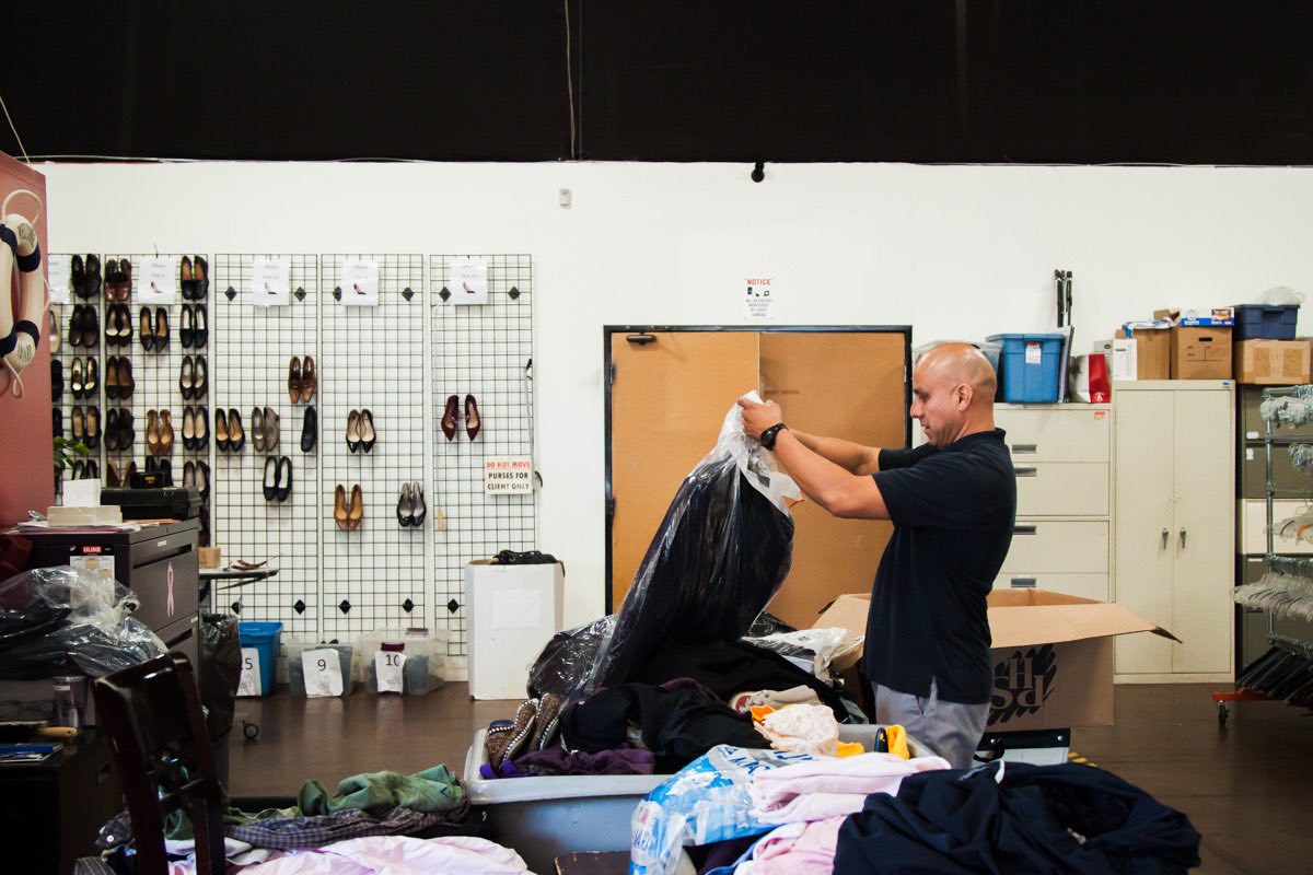 Clothing Racks Full Of Donated Work Attire At Working Wardrobes in Costa Mesa.