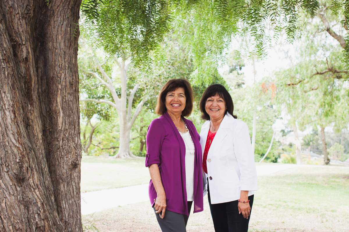 Sisters Vicki Alcala-Kelley and Lynn Alcala at the Estancia / Diego Sepulveda Adobe in Costa Mesa, California