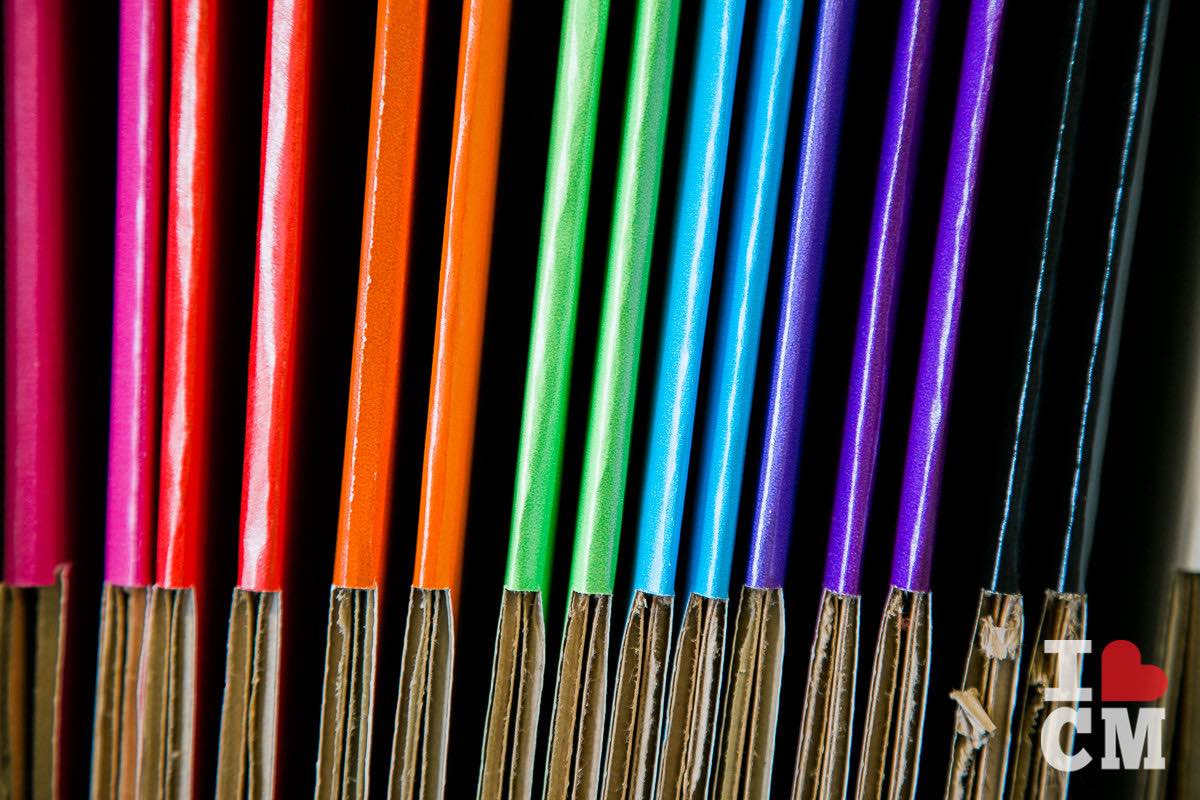 Shelf Full of Colorful Cardboard Boxes at Costa Mesa's Boxfli, Orange County