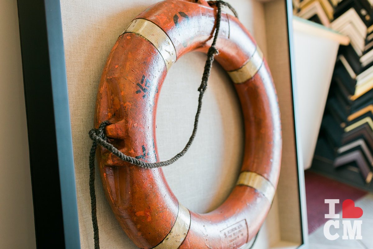 A Framed, Vintage Life Preserver at Best Framing in Costa Mesa, California