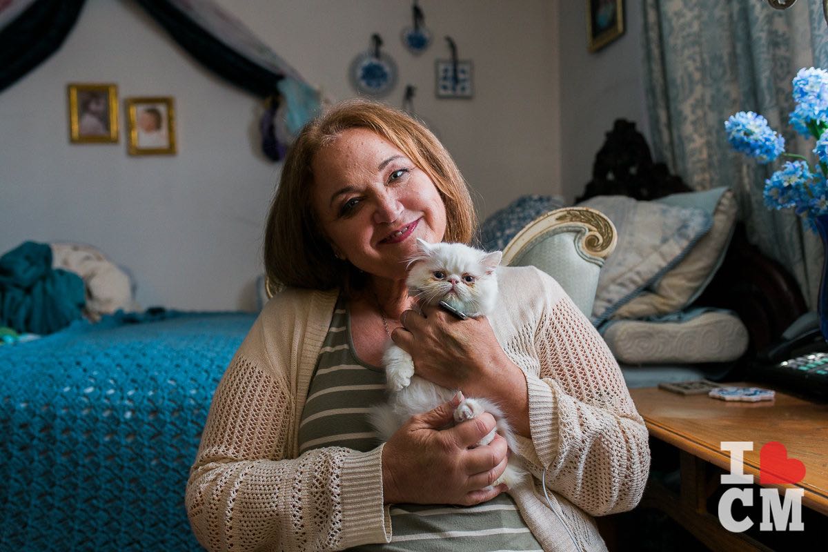 Founder and CEO of Project Cuddle, Debbe Magnusen - and her kitten, Blue - in Costa Mesa, California