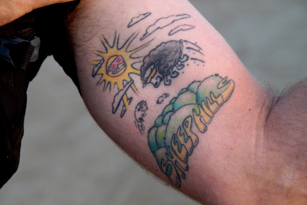 Mike "Hucker" Clark shows off his Sheep Hills tattoo. (photo: Bradley Zint)
