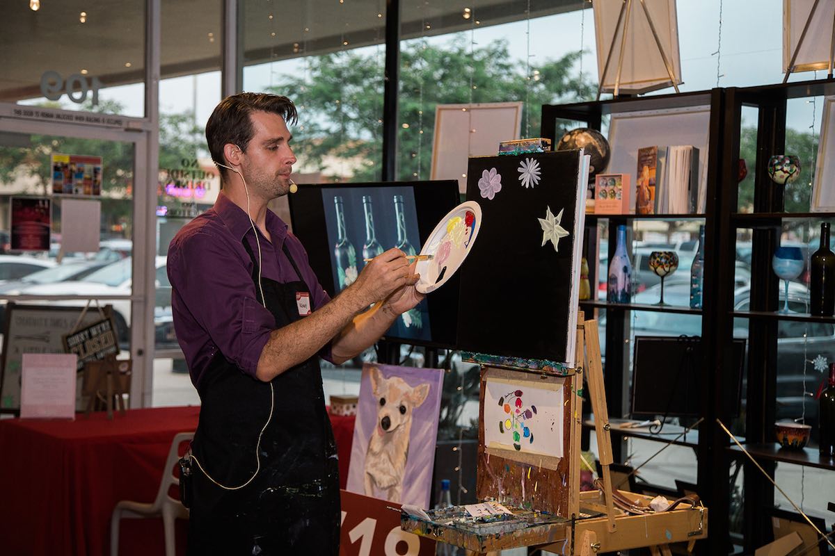 Painter, Muralist and Art Instructor, Kenny McBride, Teaches A Bottle Painting Class at InspiRED Art Wine in Costa Mesa, California. (photo: Brandy Young)