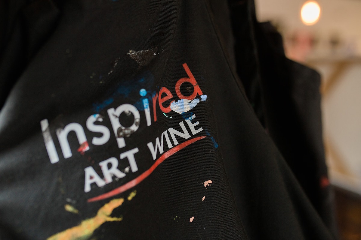 A paint-splattered apron at InspiRED Art Wine Painting Studio and Wine Bar in Costa Mesa, Orange County, California. (photo: Brandy Young)