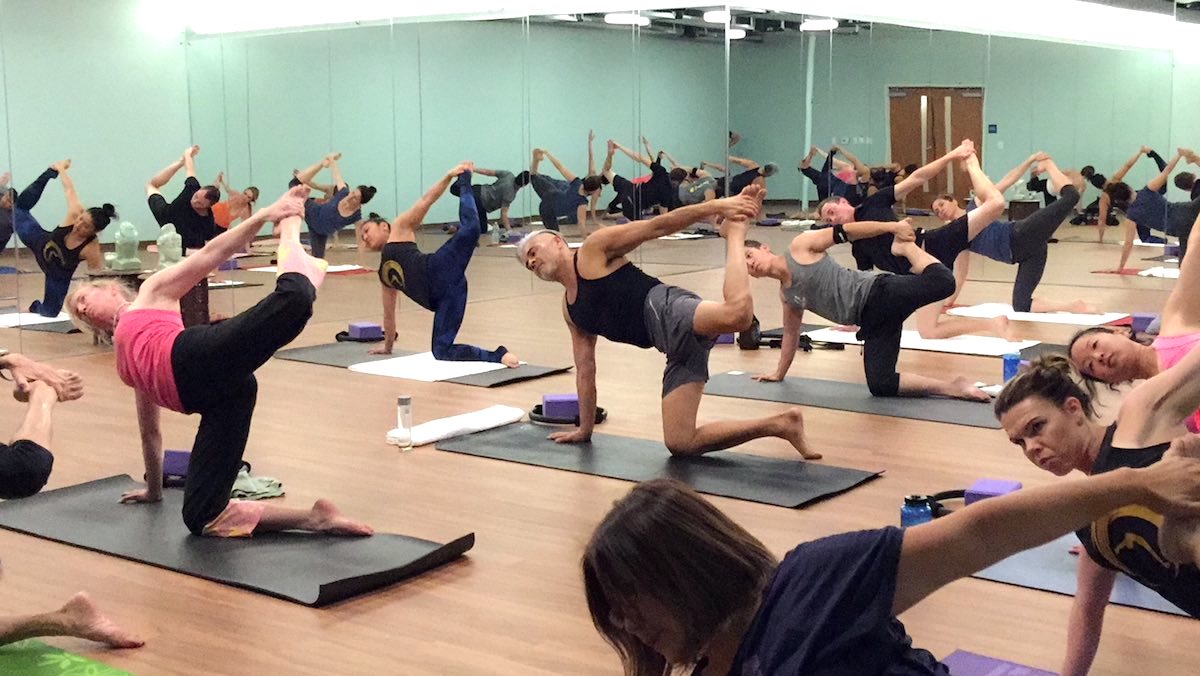 Aileen Pham leads a Yoga Class at Spectra Yoga in Costa Mesa, California. (photo courtesy of Spectra Yoga)