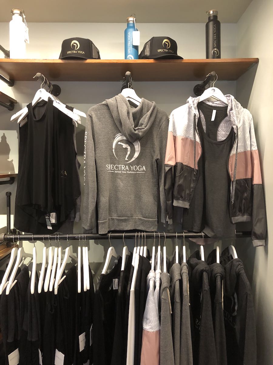 Spectra Yoga sweatshirts, hats, water bottles and more in Costa Mesa, California. (photo: Samantha Chagollan)