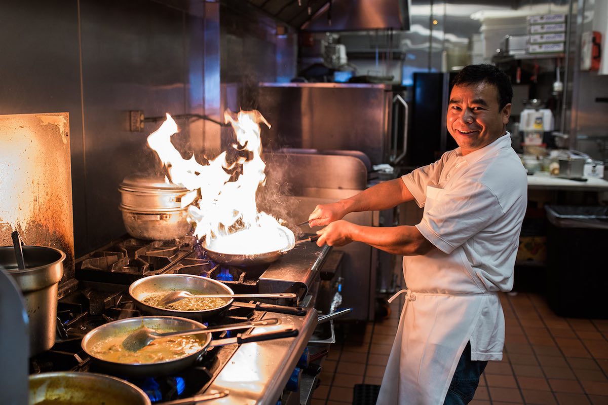 Head Cook and Owner of The India Cafe, Tilak Rana, brings his passion for cooking from Nepal to Costa Mesa. (photo: Brandy Young)