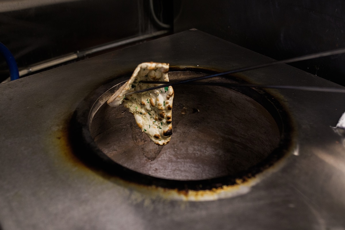 Housemade Naan cooked in a traditional clay oven at The India Cafe in Costa Mesa, California. (photo: Brandy Young)