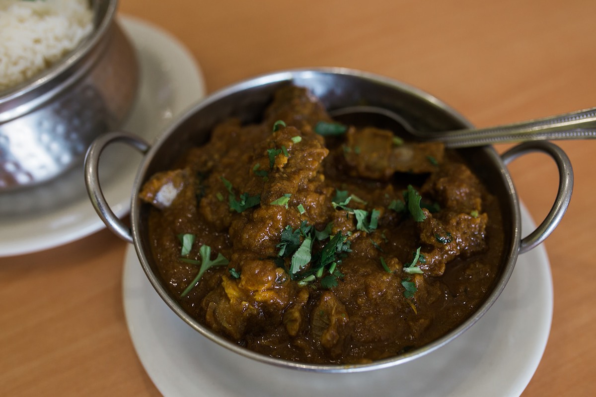 Tilak's most recommended dish: Goat Curry with tomatoes and spices served with rice. (photo: Brandy Young)