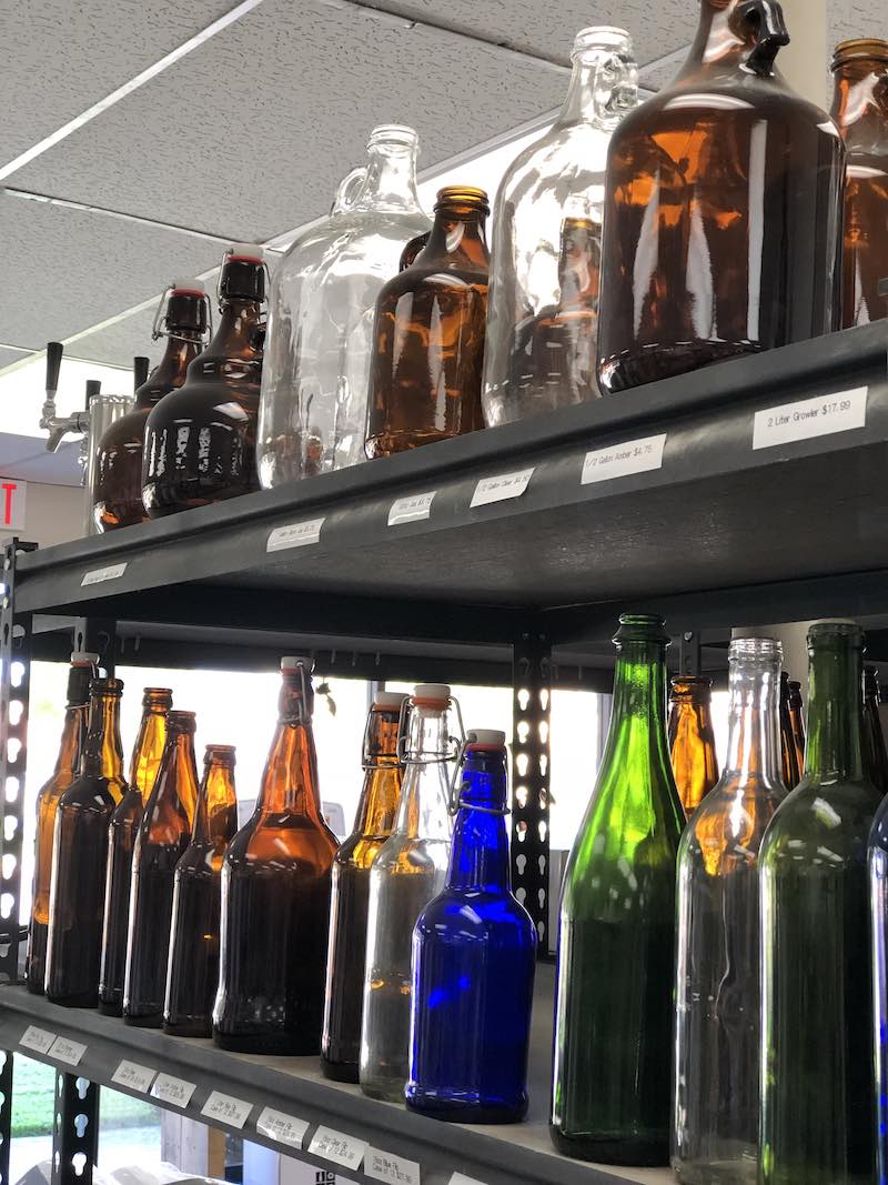 Rack of Empty Bottles and Growlers at Windsor Homebrew Supply Co. in Costa Mesa, California. (photo: Samantha Chagollan)