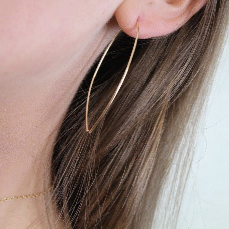 Delicate, Handmade Hoop Earrings by Jewelry Artist, Laurane Elisabeth Designs in Costa Mesa, Orange County, California. (photo: Samantha Chagollan)