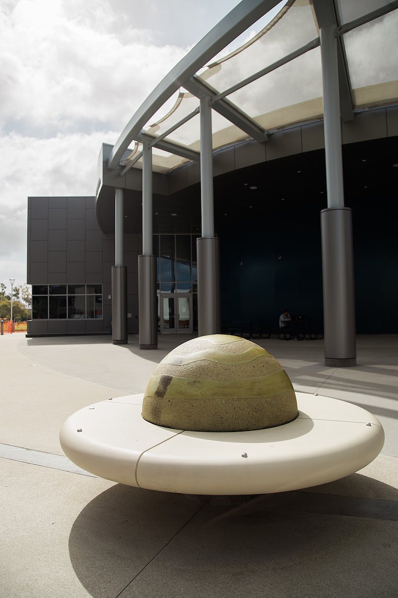 Sit and ponder the universe on the "rings of Saturn" bench outside the OCC Planetarium in Costa Mesa, Orange County, California. (photo: Brandy Young)