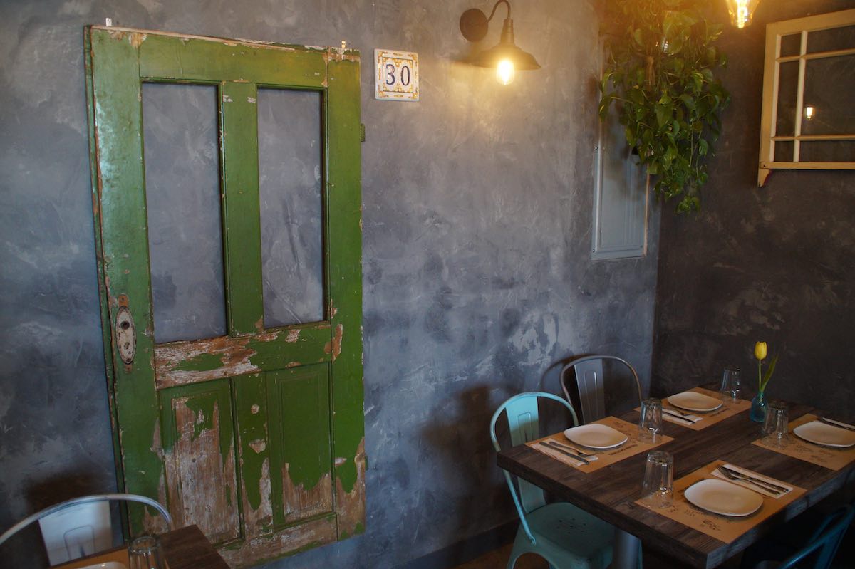 Green Door Decor at Trenta Pizza and Cucina at Midway Market in Westside Costa Mesa, Orange County, California. (photo: Bradley Zint)