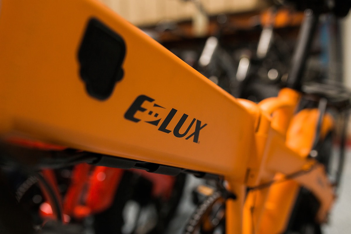 Orange bicycle at E-Lux Electric Bikes headquarters in Westside Costa Mesa, Orange County, California. (photo: Brandy Young)
