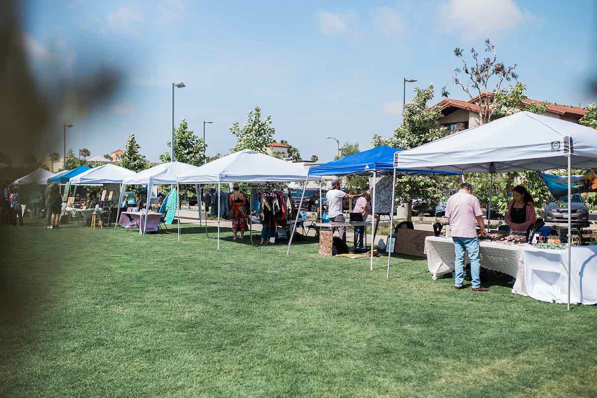 I Heart Costa Mesa: A row of artists booths on the lawn at the Costa Mesa ArtWalk at Lions Park in Costa Mesa, Orange County, California. (photo: Brandy Young)