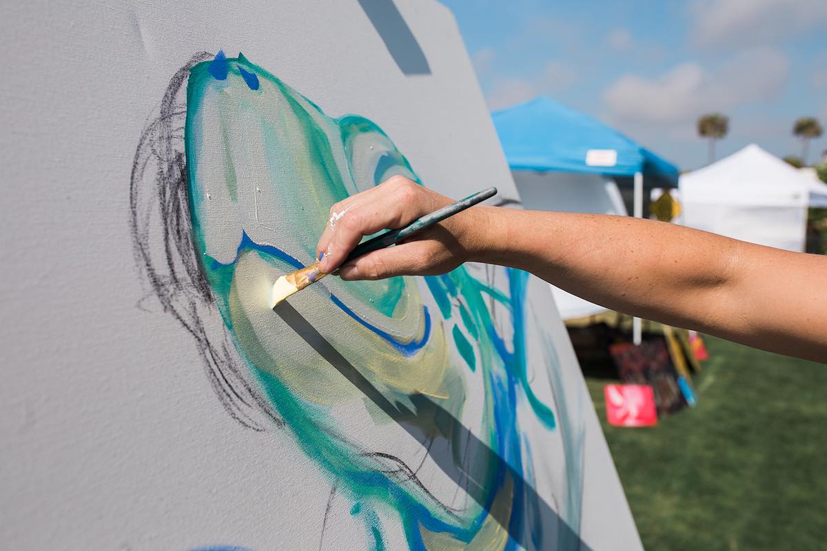 I Heart Costa Mesa: Muralist, Melissa Murphy of Huntington Beach, paints a giant sea turtle at the Costa Mesa ArtWalk at Lions Park in Costa Mesa, Orange County, California. (photo: Brandy Young)