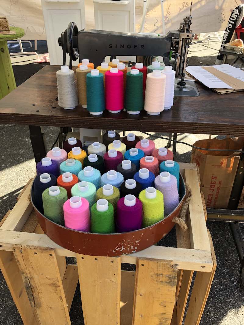 I Heart Costa Mesa: Colorful thread displayed on a crate, Sarah Jane Goods chain stitched apparel and accessories in Westside Costa Mesa, Orange County, California. (photo: Samantha Chagollan)