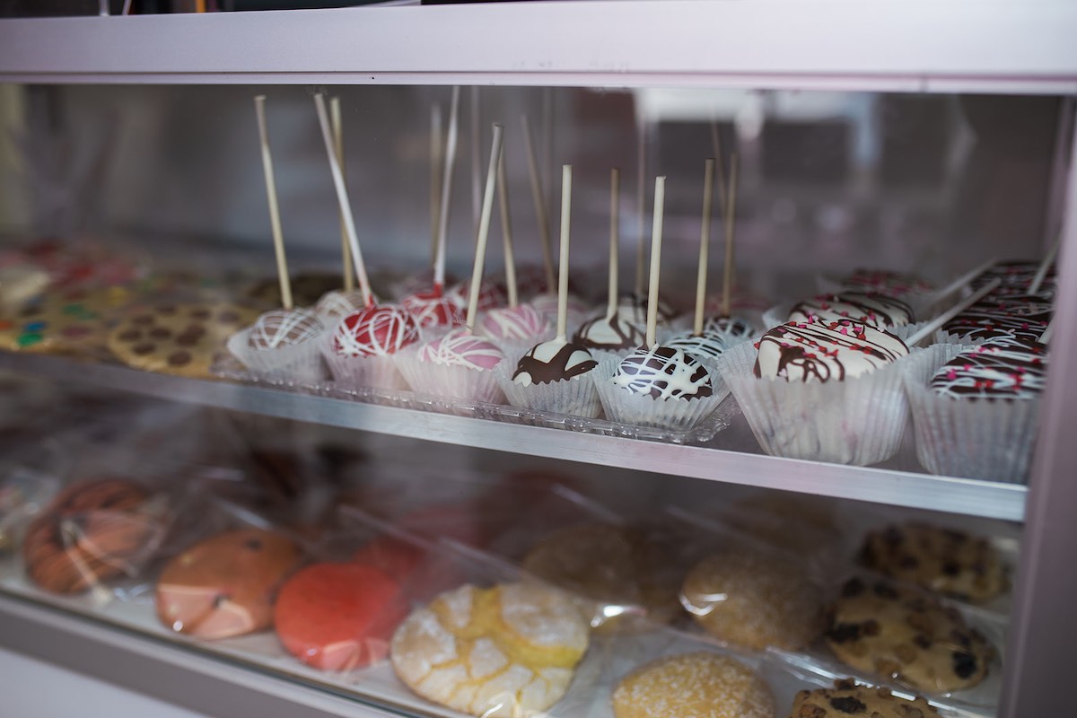 I Heart Costa Mesa: A bakery display case with fresh baked cookies and cake pops at Arenas Dream Cakes in Westside Costa Mesa, Orange County, California. (photo: Brandy Young)