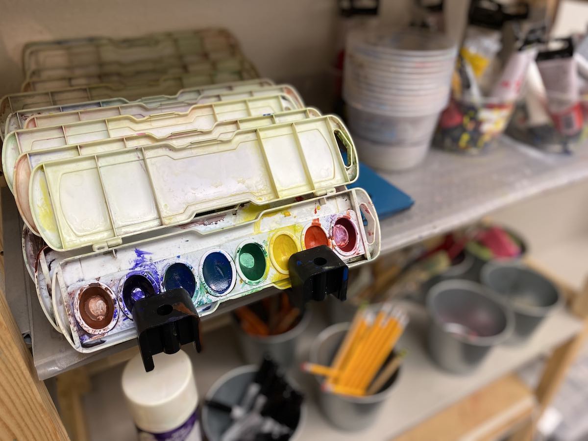 I Heart Costa Mesa: A rack of paint palettes, along with other art supplies, for art classes at the ArtSteps studio in Costa Mesa, Orange County, California. (photo: Samantha Chagollan)