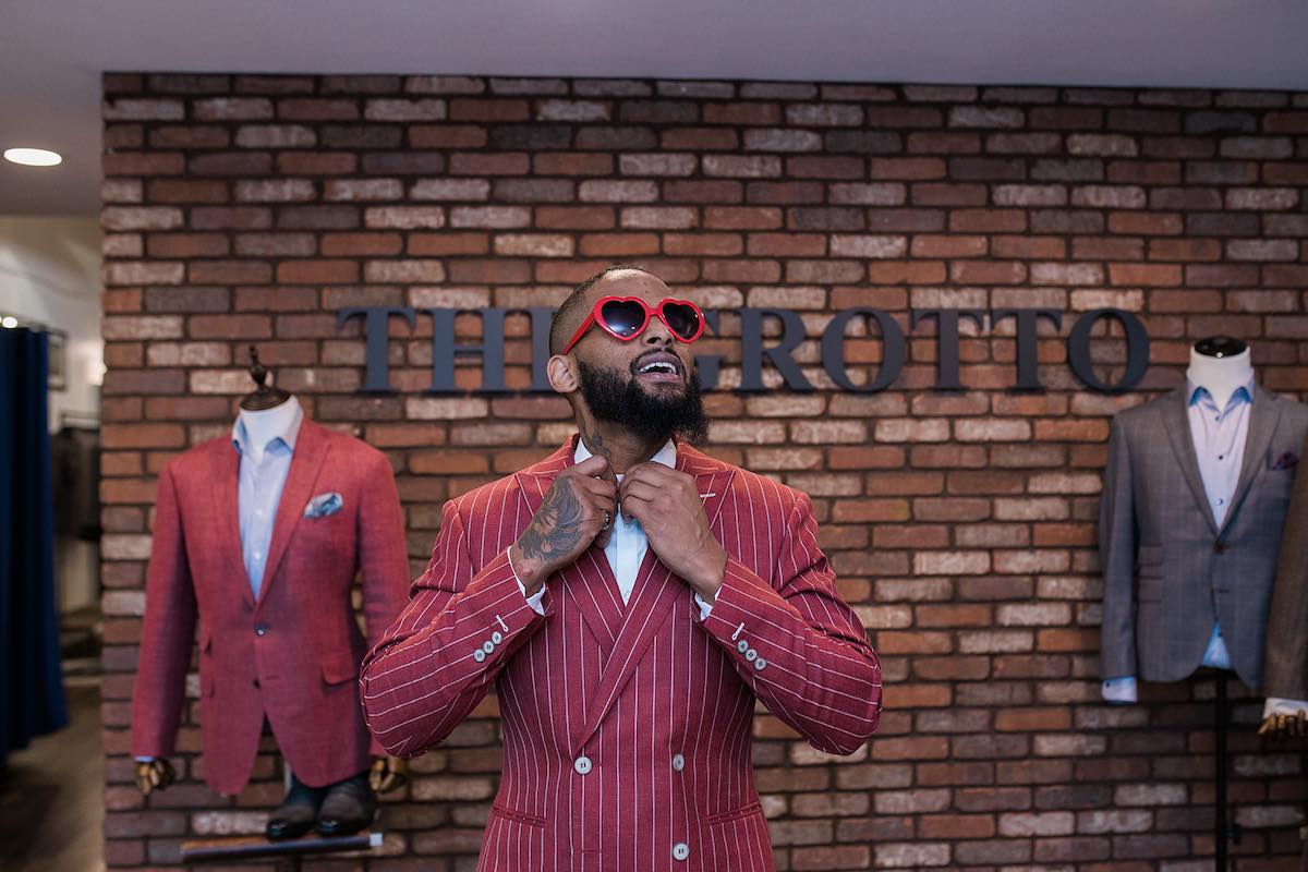 I Heart Costa Mesa: Omar Hasan models a custom pinstripe suit at The Grotto Menswear in Westside Costa Mesa, Orange County, California. (photo: Brandy Young)